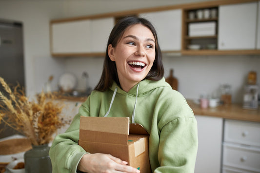 A young woman delighted with a thoughtful gift